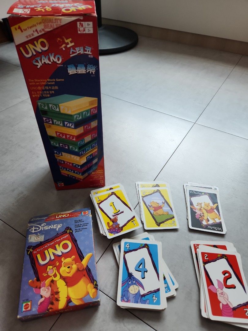 Stacko uno (Category: Board Games & Puzzles) located in Singapore. Submitted by imdecluttering (Listing ID 1317410448, Image 2). Description: Stacko was opened to check, more in storage. UNO Disney card, Pooh & friends used. But in good condition, complete set, no bend or tear. FREE with purchase of Stacko together @ $15.