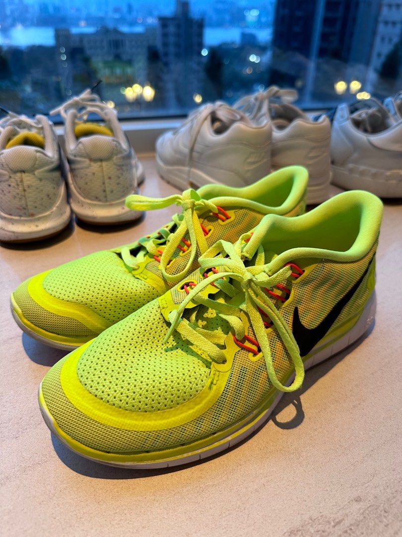 Women s Nike Free 5.0 in fluorescent green. Carousell