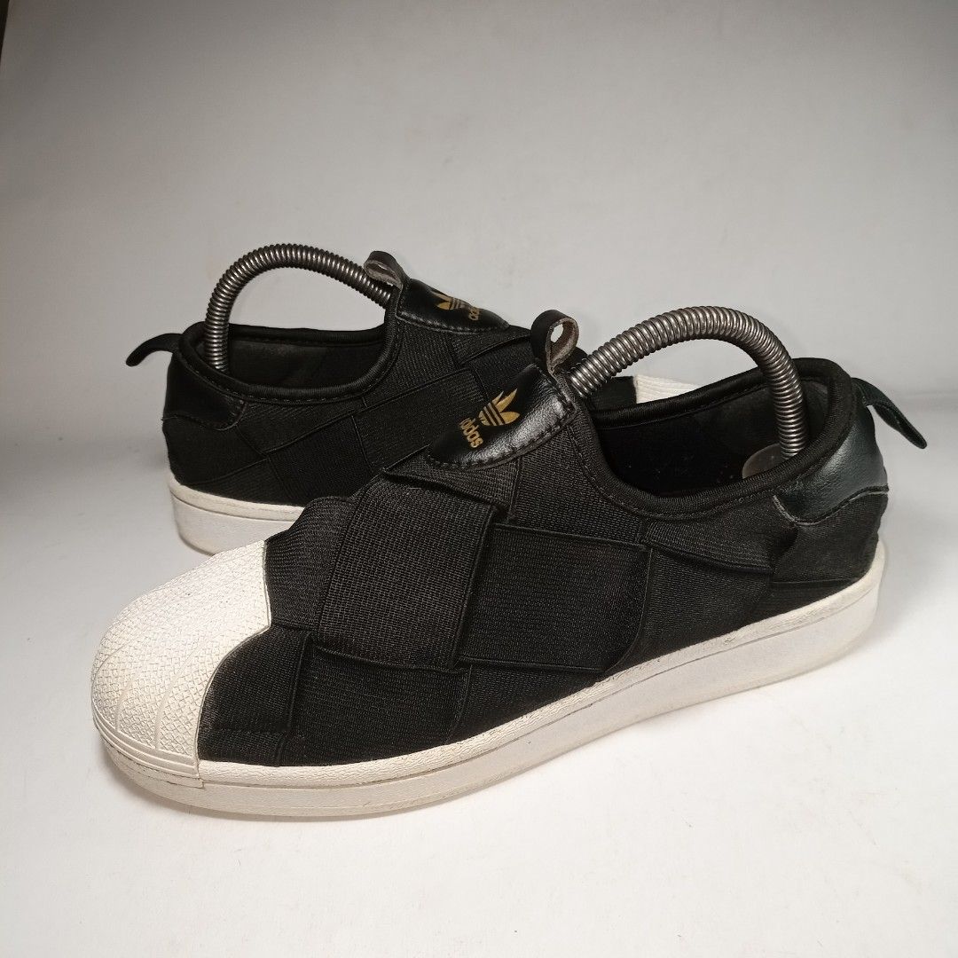 Adidas slip on wanita hot sale
