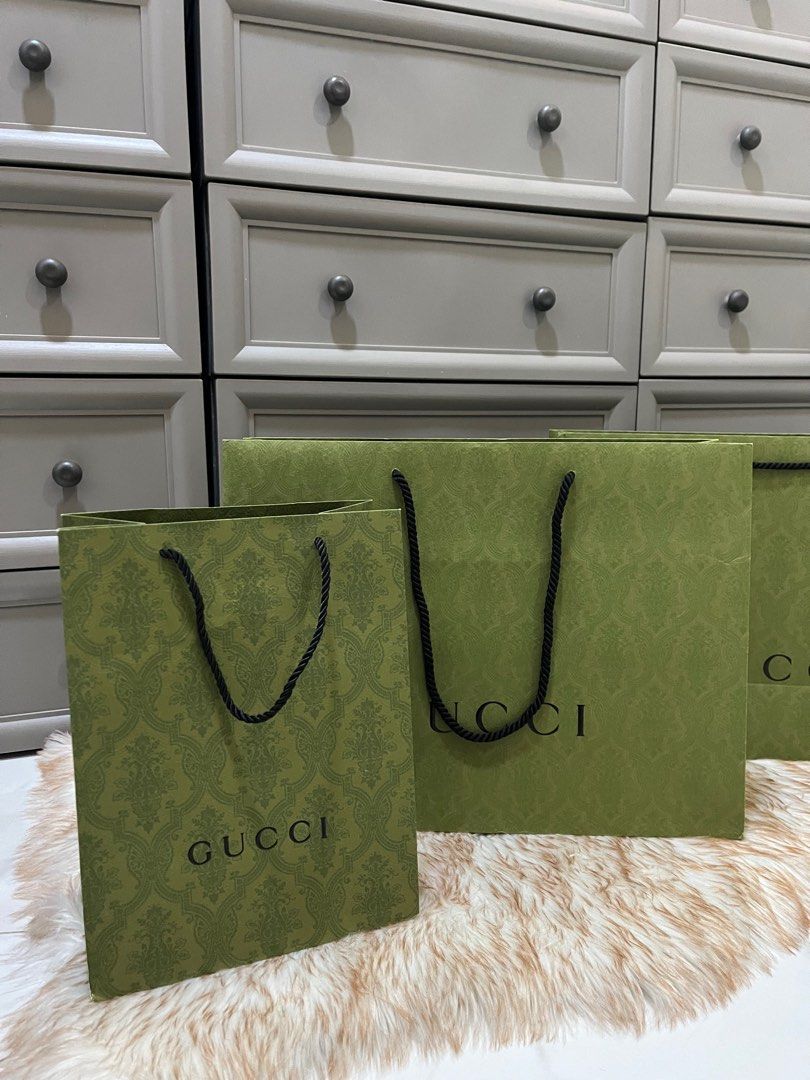 Authentic Gucci Green Paperbag (Category: Luxury Bags & Wallets) located in Quezon City. Submitted by jewelraestoyshop (Listing ID 1312325590, Image 2). Description: Authentic Gucci Green Embossed Paperbag Unfolded Unused Can send proof of authenticity from our Gucci purchases in Europe Large Size: H36 x L48 x W17 cm ₱1,000 per pc 2 pcs available Small Size: H32 x L24 x W13 cm ₱800 per pc 1 pc available .