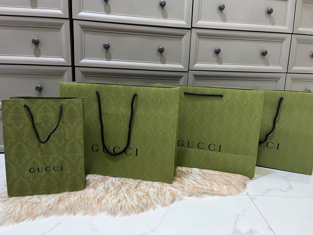Authentic Gucci Green Paperbag (Category: Luxury Bags & Wallets) located in Quezon City. Submitted by jewelraestoyshop (Listing ID 1312325590, Image 1). Description: Authentic Gucci Green Embossed Paperbag Unfolded Unused Can send proof of authenticity from our Gucci purchases in Europe Large Size: H36 x L48 x W17 cm ₱1,000 per pc 2 pcs available Small Size: H32 x L24 x W13 cm ₱800 per pc 1 pc available .