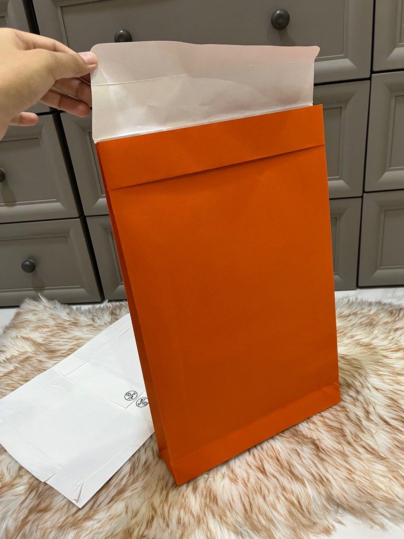Authentic Hermes Envelope Gift Bag (Category: Luxury Bags & Wallets) located in Quezon City. Submitted by jewelraestoyshop (Listing ID 1312329035, Image 2). Description: Authentic Hermes Envelope Gift Bag With Wrapping Paper inside Size: H36 x L48 x W17 cm ₱1,2per pc 3 pcs available Small Size: H42 x L27 x W6.5 cm ₱1,300 1 pc available .
