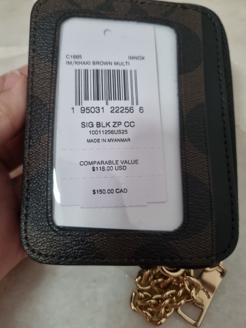 Coach pouch w chain (Category: Bags & Wallets) located in Singapore. Submitted by ajp (Listing ID 1312340463, Image 3). Description: Brand new w tag one zip with 4 card slot outside Measurement : 11 x 8cm Last photo is the price at imm outlet before 50% off..