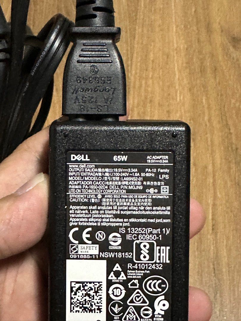 Dell Laptop Charger (Category: Chargers) located in Mandaluyong City. Submitted by jim.dc (Listing ID 1312365685, Image 2). Description: 65W.