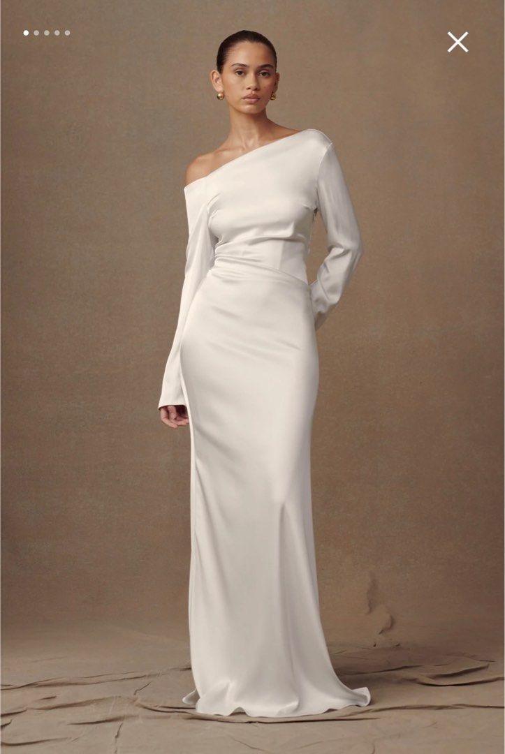 meshki wedding dress Delphine Satin Strapless Maxi Gown / White | enhanced by structured tulle and a refined horsehair hem for graceful movement Meshki Avery maxi wedding dress