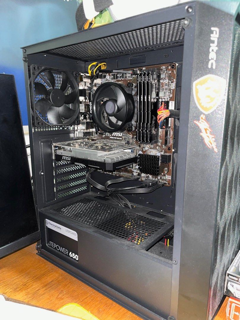 PC for Sale (Category: Desktops) located in San Juan City. Submitted by kylle_m (Listing ID 1312324415, Image 3). Description: CPU: RYZEN 5 5600G GPU: MSI GTX 1650 MOTHERBOARD: MSI B450M PRO VDH RAM: 32GB, 4PCS 8GB KINGSTON DDR4 SSD: KINGSTON 1TB NV2 PSU: THERMALTAKE LITEPOWER CASE: ANTEC NX2D2 BLACK.