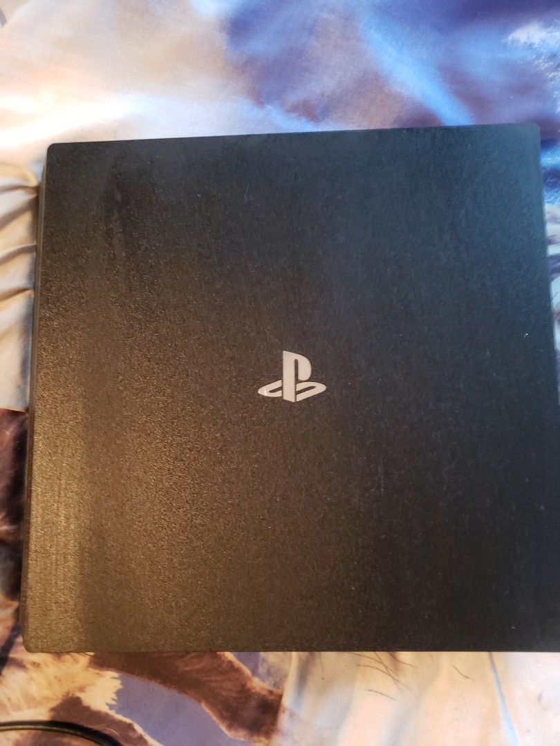 Ps4 Bundle (Category: Video Games Consoles) located in Toronto. Submitted by pinkpurple36549 (Listing ID 1312456056, Image 2). Description: PS4 excellent condition can hook up to virtual reality comes with all cords cables also comes with five games.