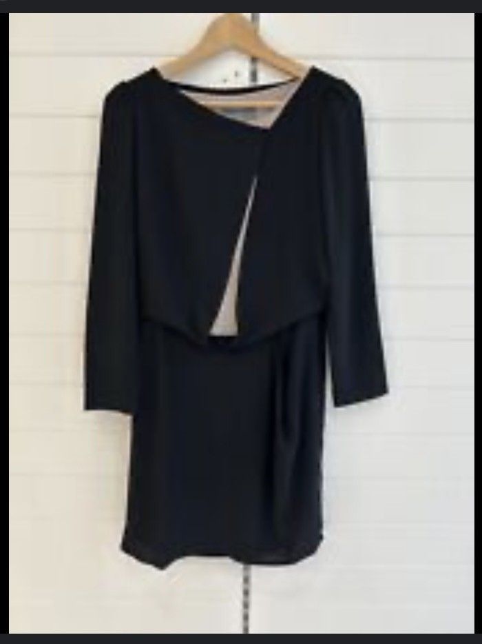 Alexaner Mcqueen black dress (Category: Luxury Apparel) located in Bansalan. Submitted by nicethriftedthings (Listing ID 1312533474, Image 1). Description: In very good condition Very elegant dress Fits S-L.