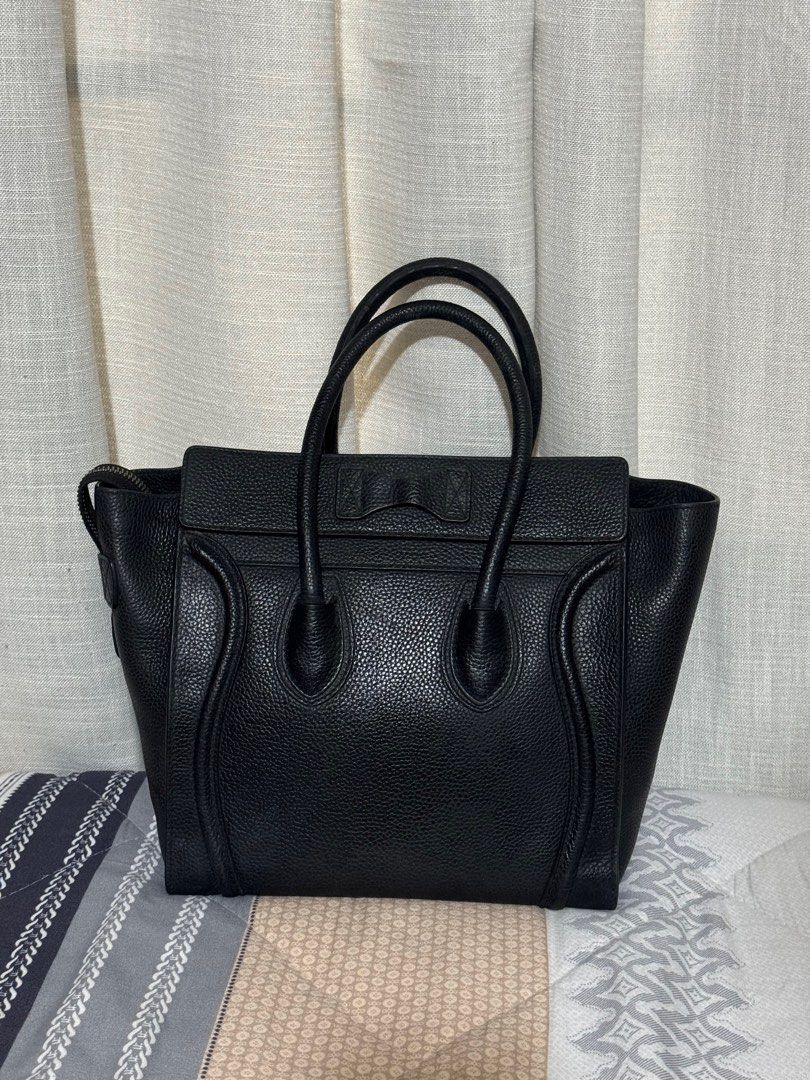 Celine Micro Luggage (Category: Luxury Bags & Wallets) located in Makati City. Submitted by annaleelim (Listing ID 1312496609, Image 2). Description: For Sale 100% Authentic Black Celine Micro Luggage Excellent Condition No Flaws Comes With Dustbag and Care Cards Asking 63K NO LOWBALLERS!!!!!! PASS SA BARAT!!!!!.