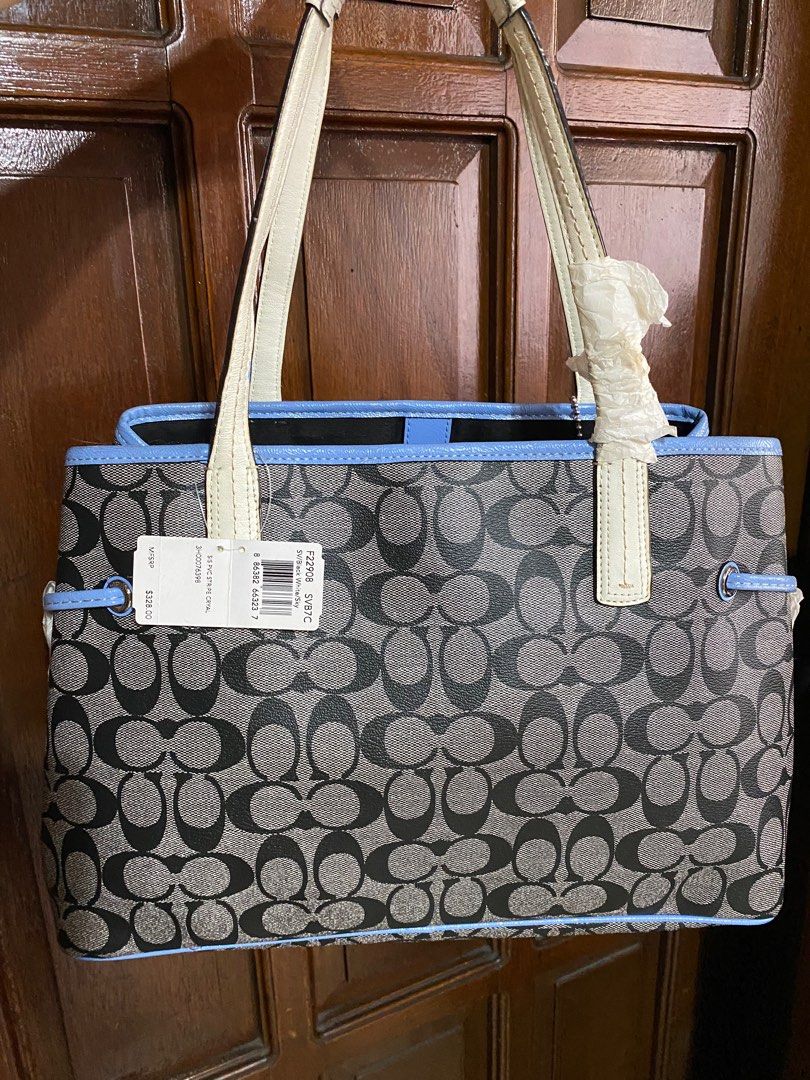 COACH - large tote bag (Category: Luxury Bags & Wallets) located in Quezon City. Submitted by goodstuff_4sale (Listing ID 1312474164, Image 3). Description: 📌📌Sale price, Last price new w tag never used, stored item ** strap issues only - see last 3 pics retails at $328 COACH original PVC stripe caryall tote sv/black white/sky 9.5 x 14 x 5.5” snap button structured bag w/ bottom studs coated canvass, easy to clean straps are off white , not rea