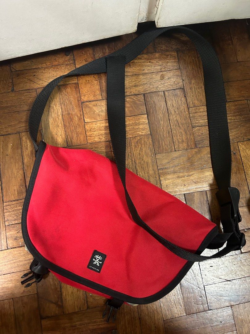 Crumpler messenger bag red sling bag (Category: Sling Bags) located in Quezon City. Submitted by projectbernice (Listing ID 1312471543, Image 1). Description: Item located in Culiat, Q.C. Will accept payment through gcash and metrobank. Delivery through j&t and lalamove at expense of buyer. Approximately 30 cm x 20 cm x 10 cm (Width x Height x Depth).