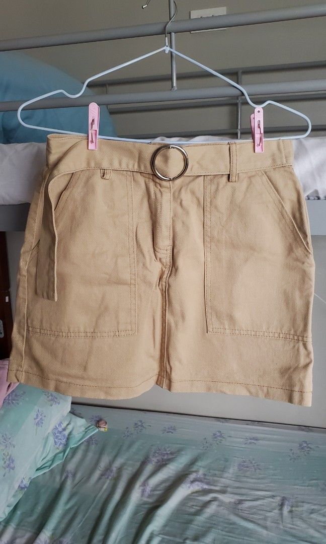 Khaki Mini Skirt (Category: Skirts) located in Manila. Submitted by jscbns (Listing ID 1312499684, Image 2). Description: Very kikay style mini skirt! Built-in belt and the pockets are functional. RFS: decluttering. i don't wear this anymore Measurements: Waist: 28 in. Hips: 18.5 in. Length: 15 in. When worn pics at the first & last slide.