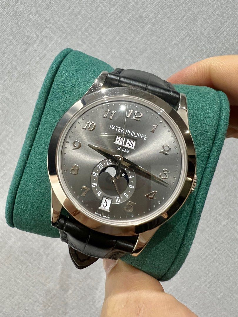 Preowned Y2019 Patek Philippe Annual Calendar White Gold Leather 5396G-014 (Category: Watches) located in Singapore. Submitted by watchgensg (Listing ID 1312568934, Image 1). Description: Model: 5396G-014 Brand: Patek Philippe Description: Full set box and papers Cert dated Y2019 Like new condition Locate us: 180 Bencoolen Street #01-68 S189646 Opening hours: 1-7pm Daily We provide in-house warranty of 6 months for all Preowned items sold. Paymen