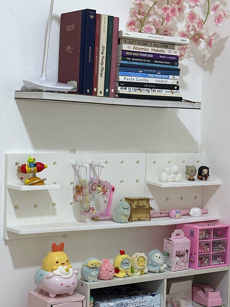 Pegboard - Storage Rack Hole Board Shelf with hanging hooks (Category: Storage Boxes & Baskets) located in Taguig. Submitted by chrryblssmhvn (Listing ID 1312641127, Image 1). Description: 3 pieces white pegboard, as is medyo may stain ung ibang parts dahil sa pinatong kong scented candle 22x22cm used adhesive. magbigay nlng ako extra adhesive na nano tape :).