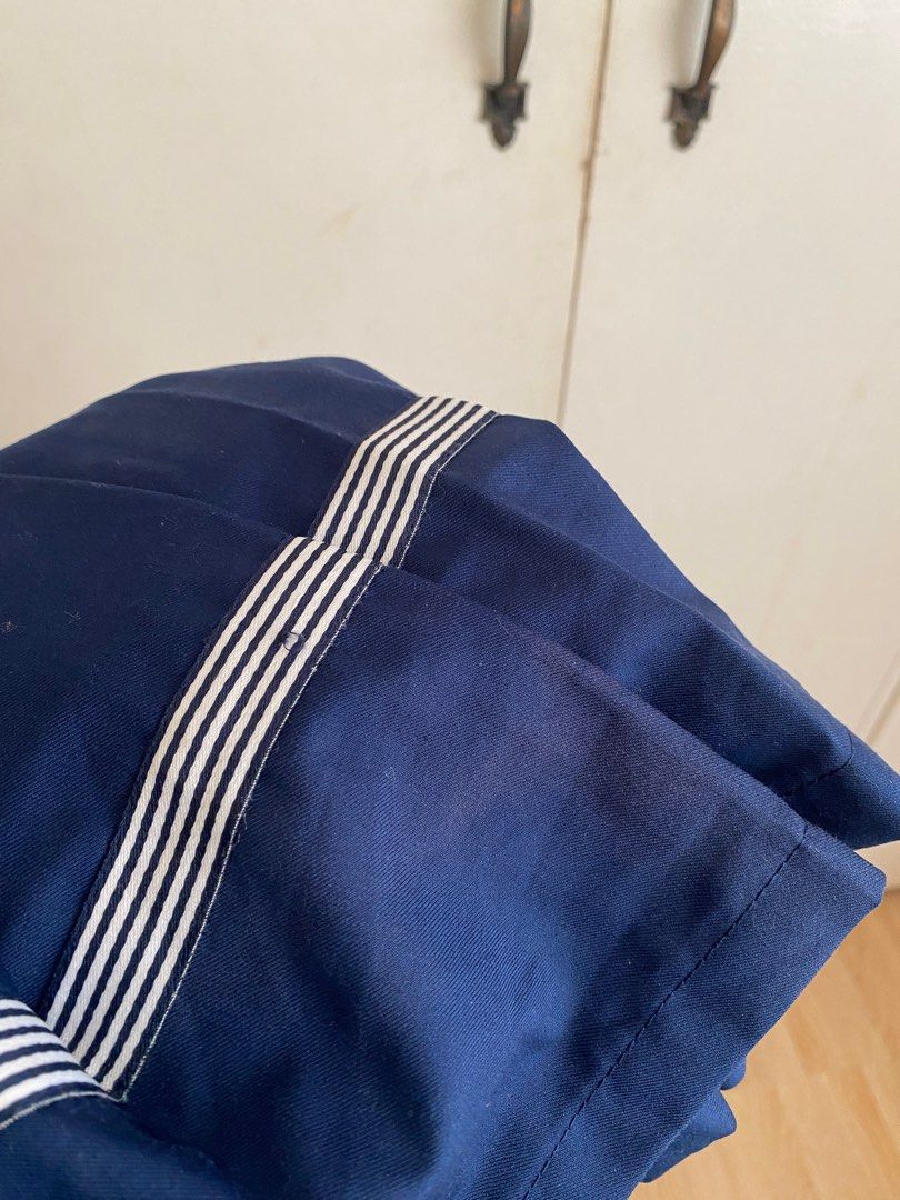 Blue skirt (Category: Skirts) located in Cavite. Submitted by _cc25 (Listing ID 1312649986, Image 3). Description: A bit of stain at the back but unnoticeable Size: Xs-S Rfs: decluttering .