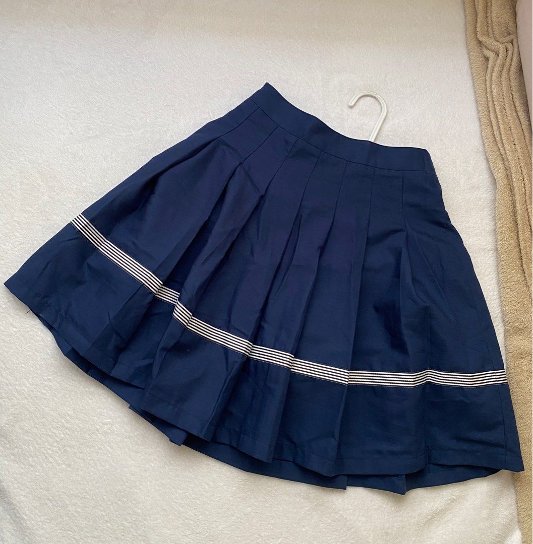 Blue skirt (Category: Skirts) located in Cavite. Submitted by _cc25 (Listing ID 1312649986, Image 1). Description: A bit of stain at the back but unnoticeable Size: Xs-S Rfs: decluttering .