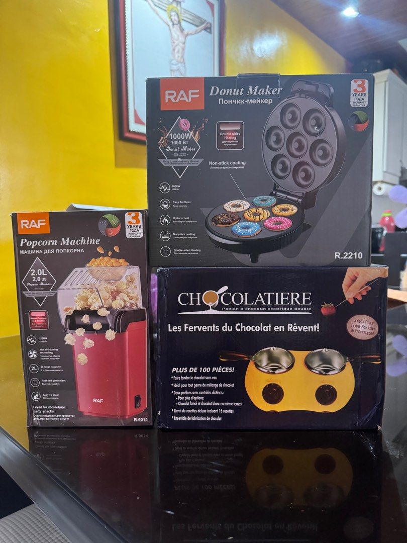 Donut maker, chocolate melter, popcorn maker (Category: Other Kitchen Appliances) located in Makati City. Submitted by wilma_583 (Listing ID 1312657421, Image 1). Description: Take all for 1,200. Choco melter brand new Donut maker and popcorn used once to try only.