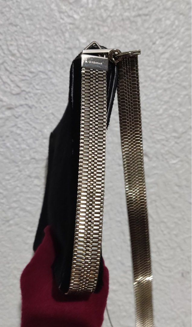 Givenchy Shark Tooth Lock Sling Bag (Category: Luxury Bags & Wallets) located in Paranaque City. Submitted by dalle_closet (Listing ID 1312743952, Image 3). Description: small size very elegant bag Fur yung material niya outside kaya medyo shiny po not faded yan super nice pa sa actual silver na silver pa mga hardwares kahit strap nya.