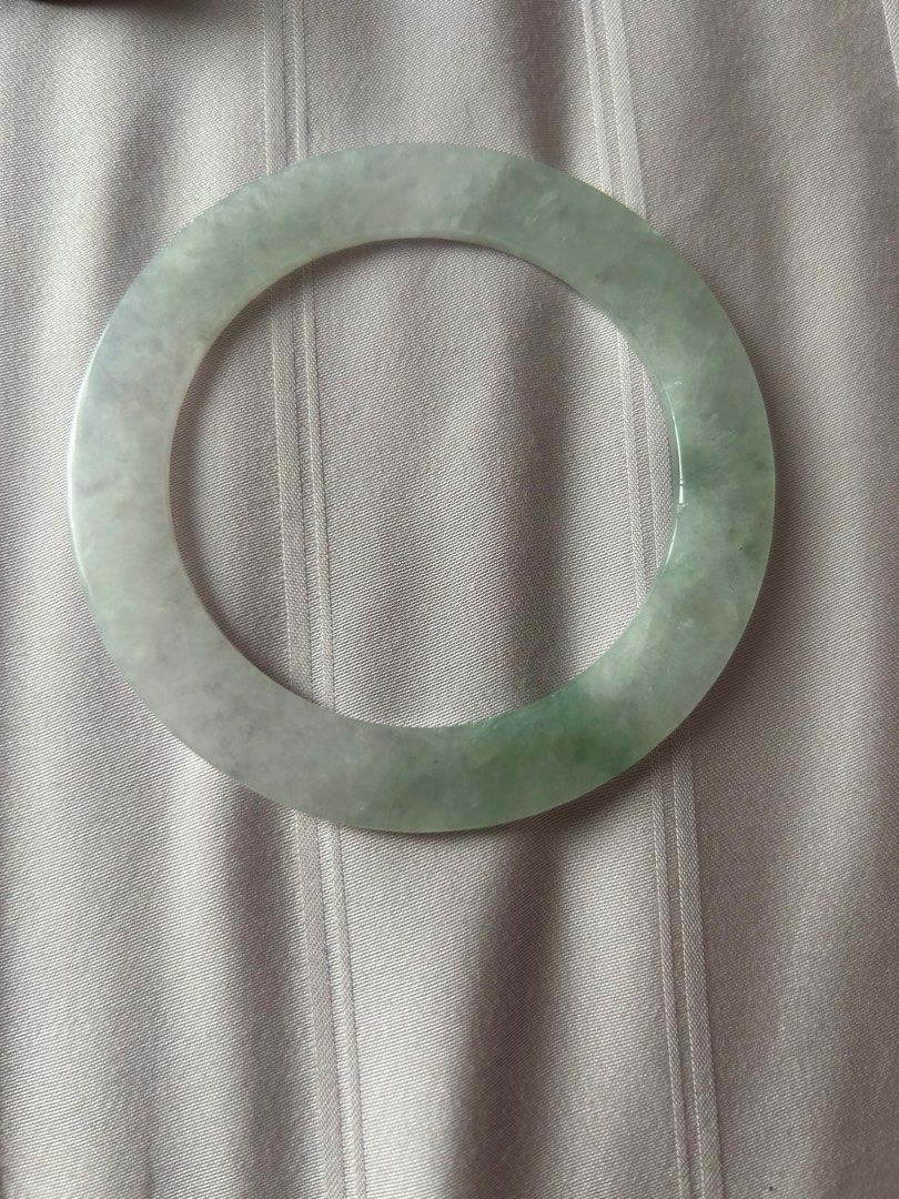 Jade Flat Bangle (icy) (Category: Precious Stones) located in Singapore. Submitted by stephychung (Listing ID 1312724708, Image 2). Description: Inner diameter 55mm Flat design. Grade A burmese jade comes with certificate Selling it as too small for me.