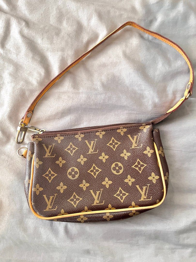 LV Mono Pouchette 90s Vintage (Category: Luxury Bags & Wallets) located in Pasig City. Submitted by wangderfulworld (Listing ID 1312814032, Image 2). Description: Preloved, 7/10 condition NGA ☑️ Very spacious, this is bigger (not like the mini pouchette) ☑️ Mono leather is in excellent condition ☑️ Vachetta handle has no cracks on top part, only under it but still intact ☑️ Vachetta piping has minimal rubs (signs of use), but no cracks/tear ☑️ Fa