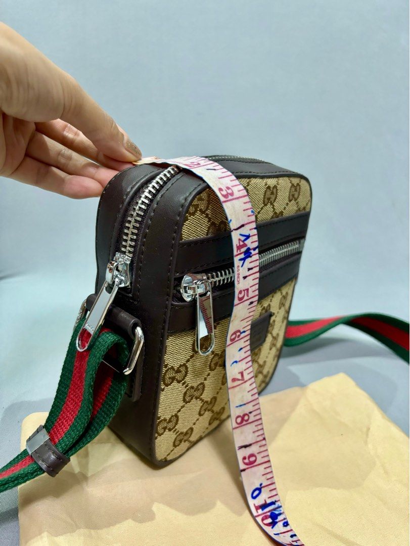Preloved gucci sling men (Category: Luxury Bags & Wallets) located in Cebu City. Submitted by day.98 (Listing ID 1192492914, Image 2). Description: from japan surplus small size pvc leather no flaws with dust bag.