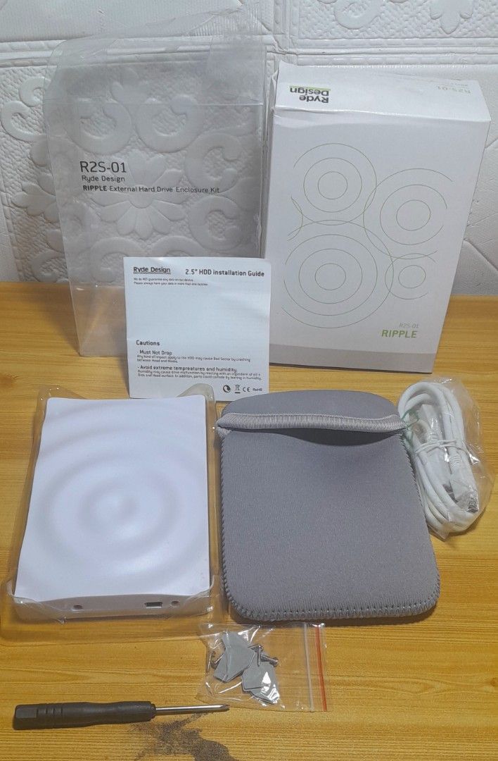 Ripple external hard drive enclosure kit (Category: Hard Disks & Thumbdrives) located in Tuba. Submitted by lous.stuff (Listing ID 1312798294, Image 2). Description: new complete accesories 3pcs avail pm nasa pics ang specifications and system reqts wysiwyg.