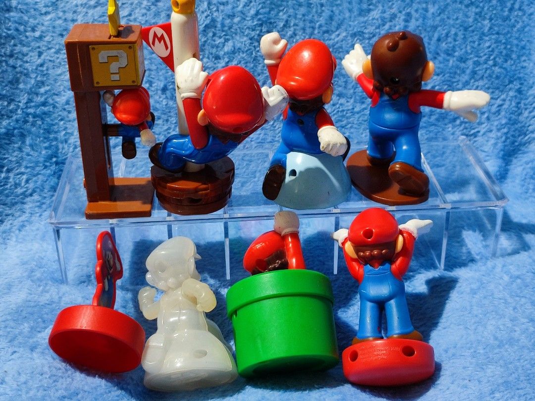 SUPER MARIO Characters-Mcdo Toys (Category: Character Goods) located in Baguio. Submitted by abigailmyra (Listing ID 1312690772, Image 3). Description: PHP 25, 35, 45 each details in the pictures by Mcdo Mario, Luigi, Princess Peach, Yoshi, Bowser, Toad loc: Baguio -CAR.