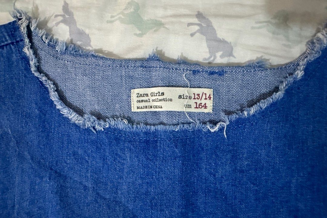 Zara Girls Denim Top (Category: Blouses) located in Paranaque City. Submitted by kryptonnyte (Listing ID 1312785722, Image 3). Description: Armpit to armpit when laid flat: 16 inches Low ballers and demanding potential buyers will be ignored. Please dont ask for the last price if you are not going to purchase the item. Let’s not waste each other’s time 😊 No when worn photos.