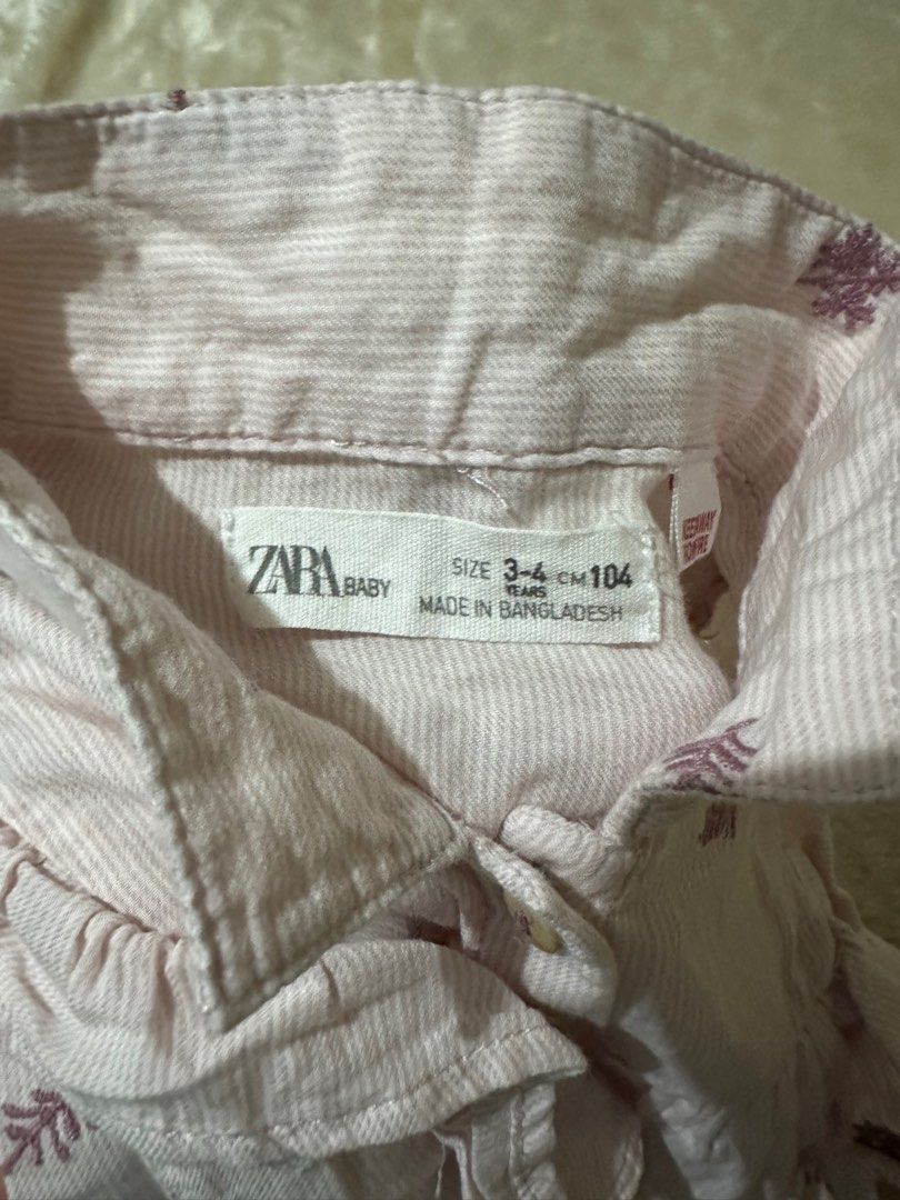 Zara longsleeves polo top (Category: Babies & Kids Fashion) located in Marikina City. Submitted by clariesplace (Listing ID 1312750599, Image 2). Description: Size 3-4y.