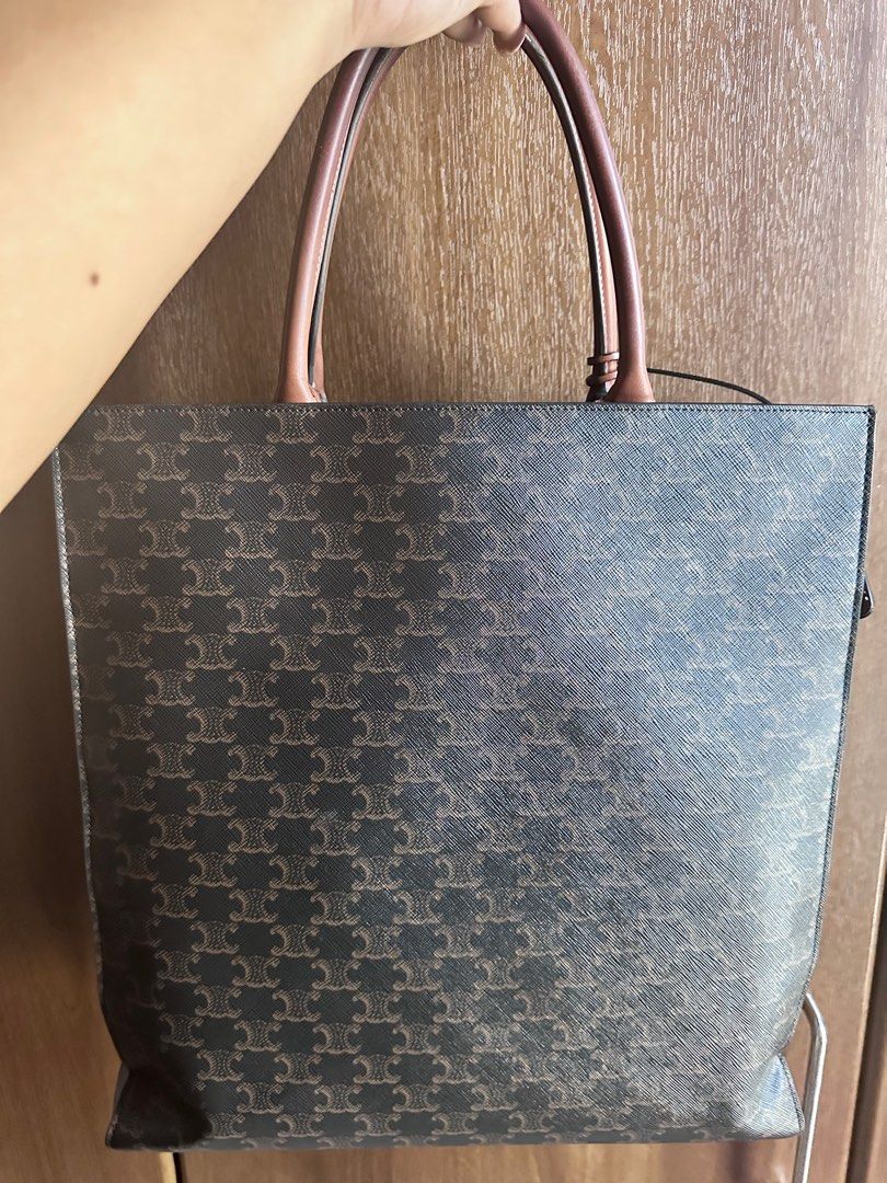 Authentic Celine Vertical Triomphe Cabas Tote (Category: Luxury Bags & Wallets) located in Rizal. Submitted by SummerPeaCloset (Listing ID 1312974486, Image 2). Description: Celine Dark Brown Triomphe Coated Canvas and Leather Medium Vertical Cabas Tote Guaranteed Authentic This design has no long strap With lock and key and provided dustbag Dimensions: Length 36 cm Width 10 cm Height 38 cm Handle Drop 16 cm Pls check the last photo for the minor