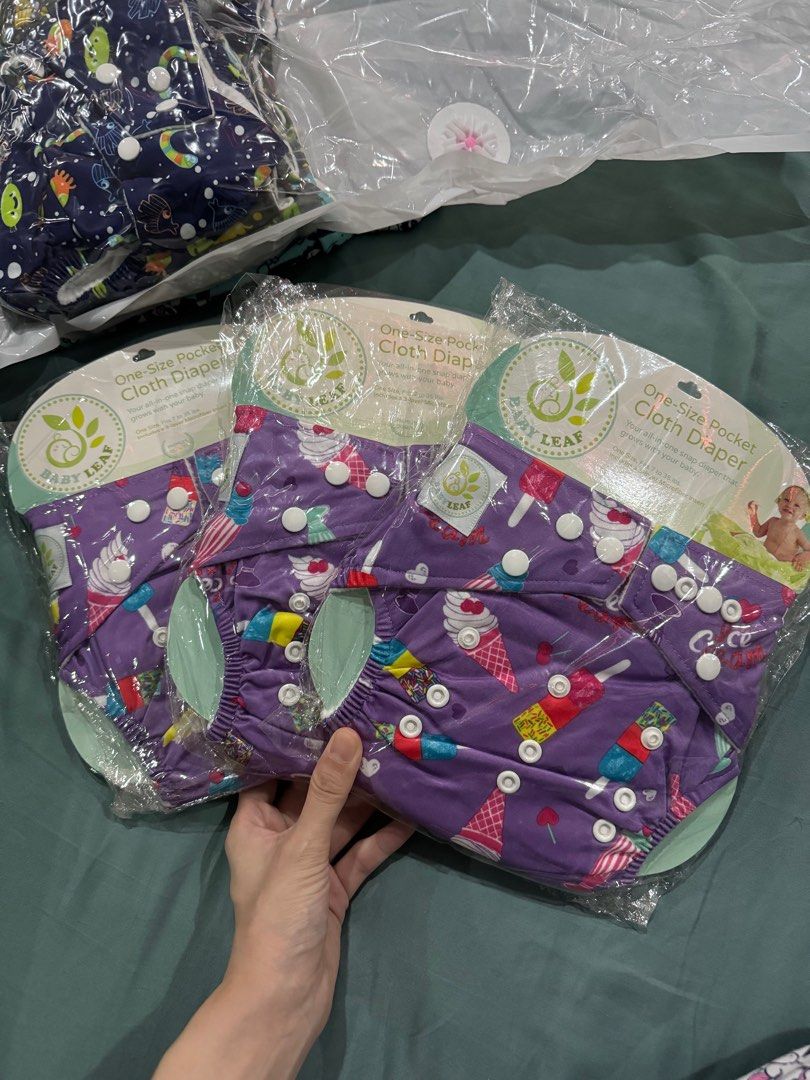 Bnew Baby Leaf Reusable Diapers (Category: Diapers & Baby Wipes) located in San Juan City. Submitted by lennychan90 (Listing ID 1312593109, Image 2). Description: Price is per piece Avail: +3 pcs ice cream purple - 1pc left +6 pcs animals/safari grey +6 pcs underwater blue Never used Baby Leaf reusable diaper Complete packaging SRP 395 Features: Generous sizing Snap buttons adjust the sizing to fit small, medium and large babies Trim, snug and co