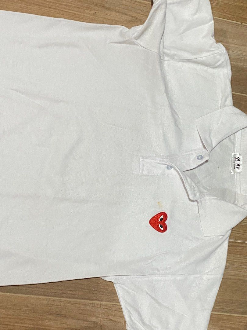 CDG COMME DES GARCONS PLAY POLO SHIRT (Category: Tshirts & Polo Shirts ) located in Pasig City. Submitted by vampwiro (Listing ID 1313003566, Image 1). Description: 📐20x26 ❗️Off ❗️w/ stain (need wash) .