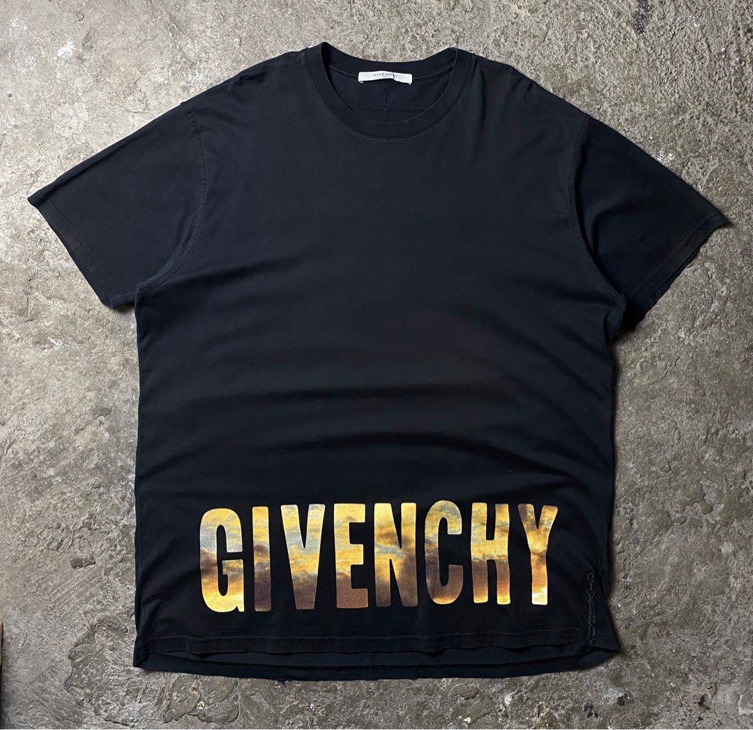 Givenchy Sunset Logo Print (Category: Tshirts & Polo Shirts ) located in Quezon City. Submitted by insidethreads_ (Listing ID 1312900651, Image 1). Description: Size: L fits oversized Width: 25 Length: 31.5 Sleeve: 9 Shoulder: 21 Condition: 7/10 Columbian fit Material: 100% Cotton Made in Portugal Flaws: Color fading on front & sleeves 1 pinhole 2 Scratches on hem It adds character imho .