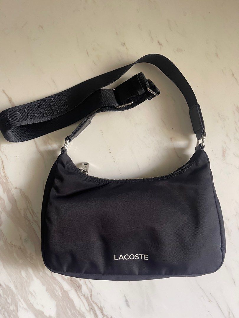 Lacoste Nylon crossbody bag (Category: Luxury Bags & Wallets) located in Makati City. Submitted by mysuitecloset (Listing ID 1312846394, Image 1). Description: .