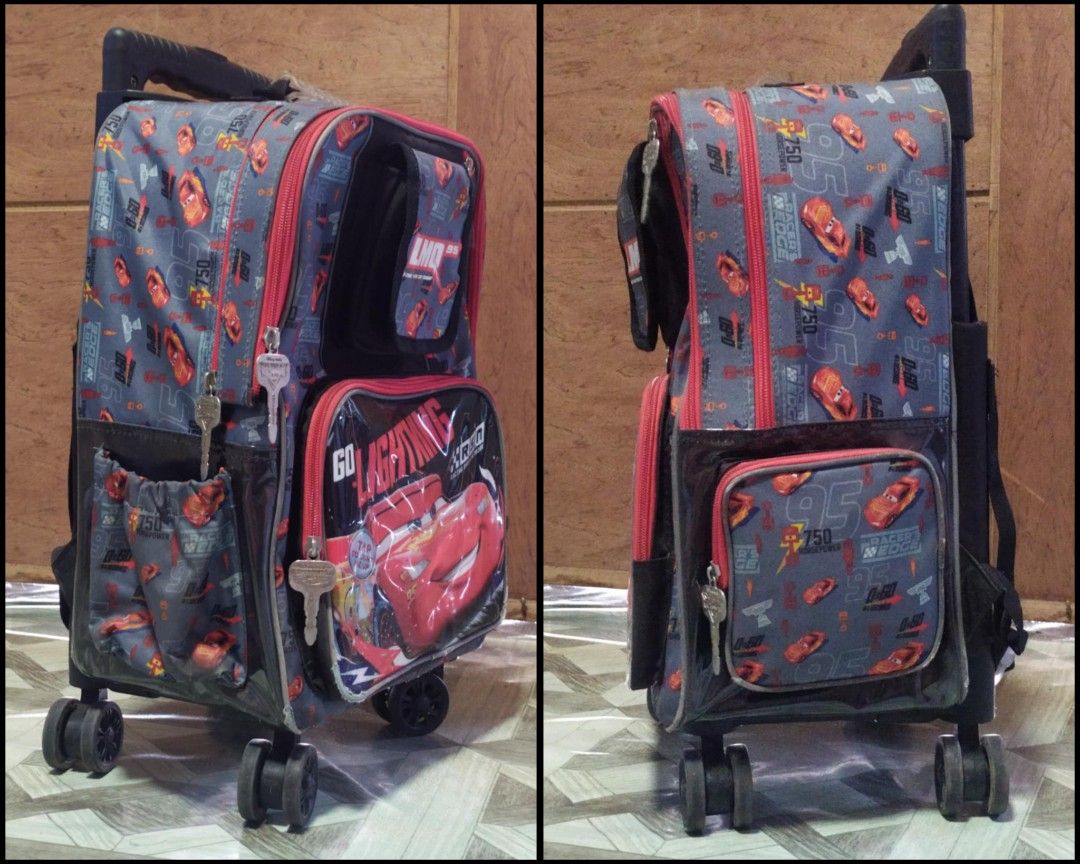 McQueen Trolley Bag (Category: Strollers) located in Rizal. Submitted by _princess_szarah_ (Listing ID 1312902079, Image 2). Description: - bought this for ₱3,495 - slightly used - with minimal flaws - saglit Lang nagamit dahil backpack ang gusto. - super smooth pa Ng wheels, walang bakbak - with rain cover - gumagana pa ung light sa harap pag tinap ung bag. (can send video).