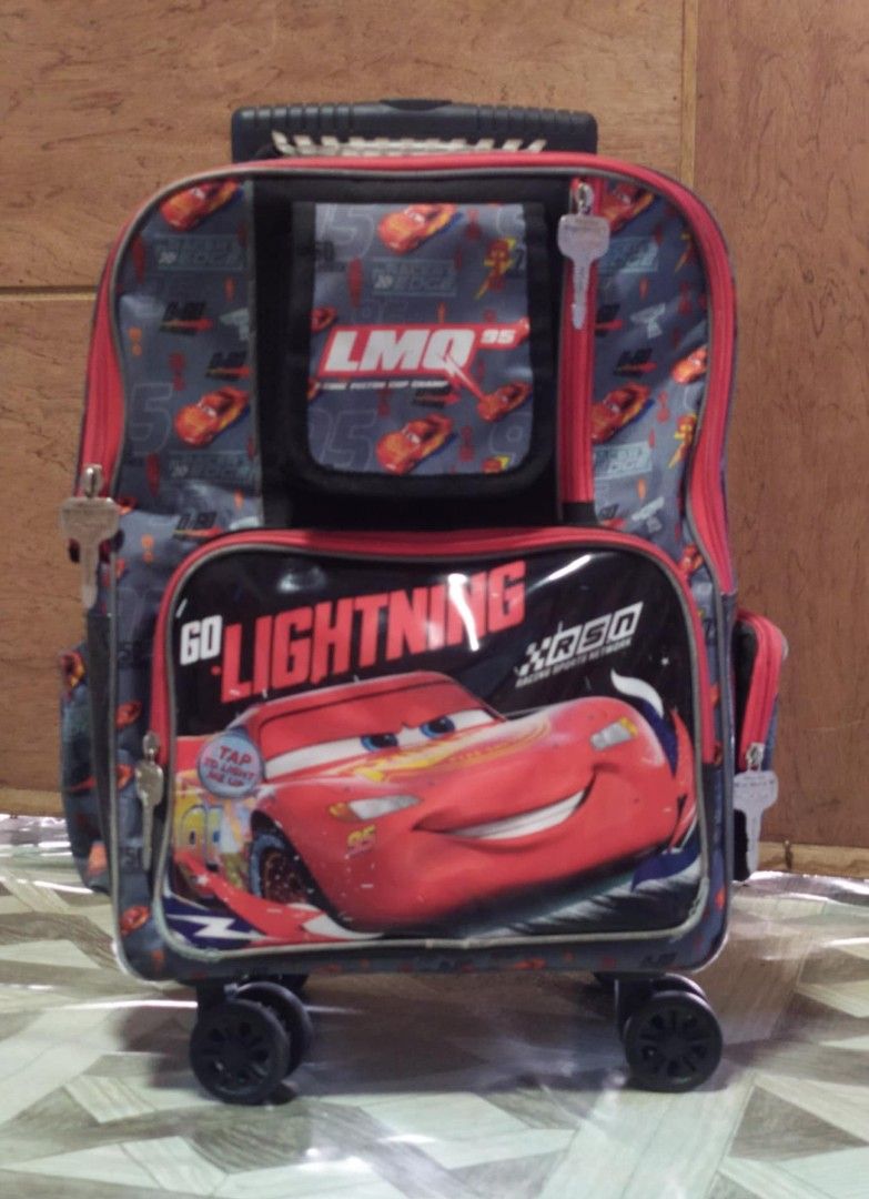 McQueen Trolley Bag (Category: Strollers) located in Rizal. Submitted by _princess_szarah_ (Listing ID 1312902079, Image 1). Description: - bought this for ₱3,495 - slightly used - with minimal flaws - saglit Lang nagamit dahil backpack ang gusto. - super smooth pa Ng wheels, walang bakbak - with rain cover - gumagana pa ung light sa harap pag tinap ung bag. (can send video).