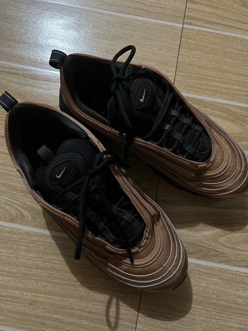 Nike Air Max 97 Copper (Category: Sneakers) located in Makati City. Submitted by declutterwjn_ (Listing ID 1312972103, Image 3). Description: Used and has some cracks as seen on the photos but are not noticeable from afar. Still usable though. .