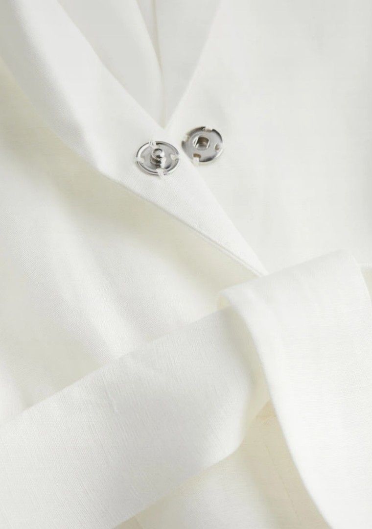 Tailored Jumpsuit H&M (Category: Jumpsuits) located in Paranaque City. Submitted by mediumcloset (Listing ID 1312870037, Image 3). Description: Never been used, no tag, original H&M white jumpsuit in storage. Versatile, can be worn in the office, casual, beach, and formal events, so it's a great investment. Breathable, soft and comfy fabric. Original price bought at P2,690 in Zalora. Already out of stock so this is your chance! Reason for Selling