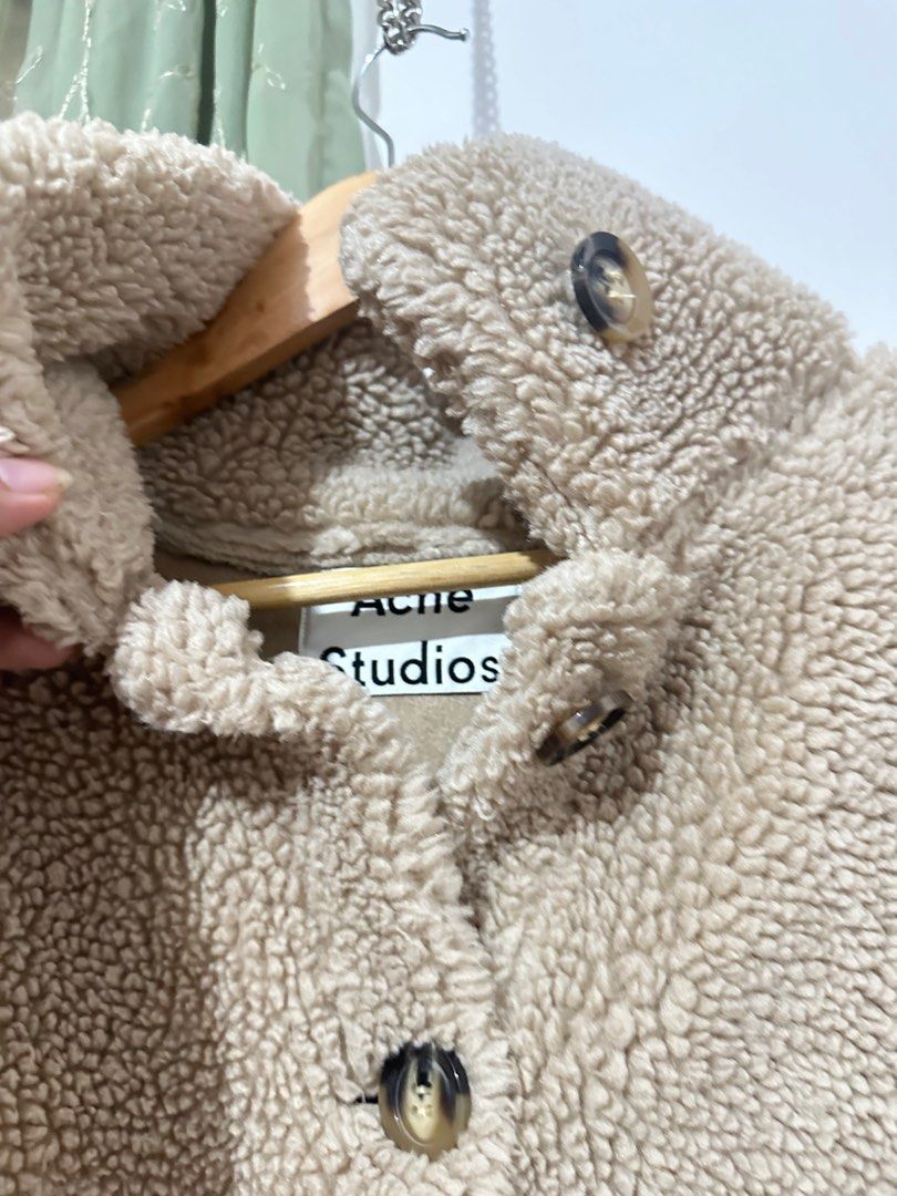 Acne Studios Brown Soft Teddy Fleece Jacket in Hazel Beige Fur (Category: Coats, Jackets and Outerwear) located in Baguio. Submitted by miss_misery (Listing ID 1313109708, Image 3). Description: Check last photos for when worn pic. Bought at Acne Studios HK Arm: 19-20” Length: 27-28” Width: 23” Item Info • Insulated Polyester Fleece Jacket • Spread Collar • Button Closure • Vented Side Seam Body: 100% polyester.