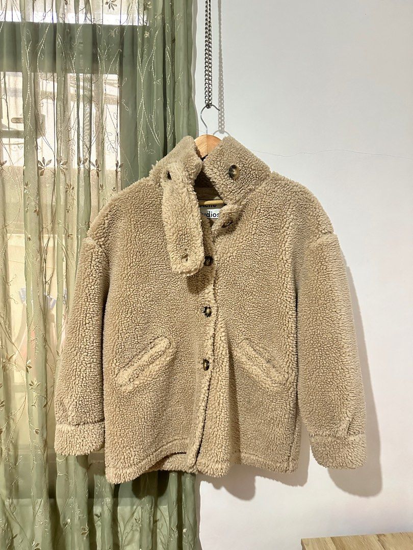 Acne Studios Brown Soft Teddy Fleece Jacket in Hazel Beige Fur (Category: Coats, Jackets and Outerwear) located in Baguio. Submitted by miss_misery (Listing ID 1313109708, Image 1). Description: Check last photos for when worn pic. Bought at Acne Studios HK Arm: 19-20” Length: 27-28” Width: 23” Item Info • Insulated Polyester Fleece Jacket • Spread Collar • Button Closure • Vented Side Seam Body: 100% polyester.
