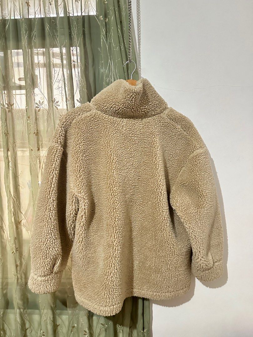 Acne Studios Brown Soft Teddy Fleece Jacket in Hazel Beige Fur (Category: Coats, Jackets and Outerwear) located in Baguio. Submitted by miss_misery (Listing ID 1313109708, Image 2). Description: Check last photos for when worn pic. Bought at Acne Studios HK Arm: 19-20” Length: 27-28” Width: 23” Item Info • Insulated Polyester Fleece Jacket • Spread Collar • Button Closure • Vented Side Seam Body: 100% polyester.