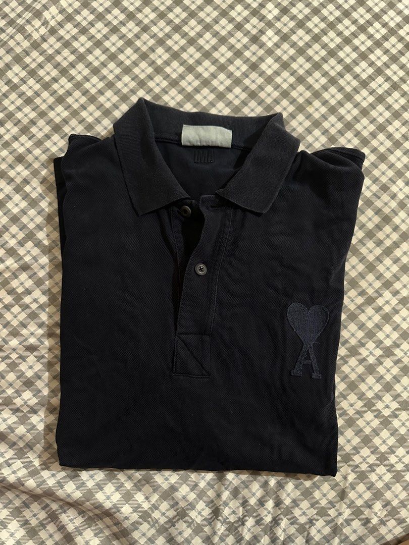 Authentic Ami Navy Blue Tonal Polo Shirt (Category: Tshirts & Polo Shirts ) located in Arayat. Submitted by unloadingg101 (Listing ID 1313181768, Image 1). Description: size L fits XL- XXL 25 x 29 good condition authentic heavy fabric.