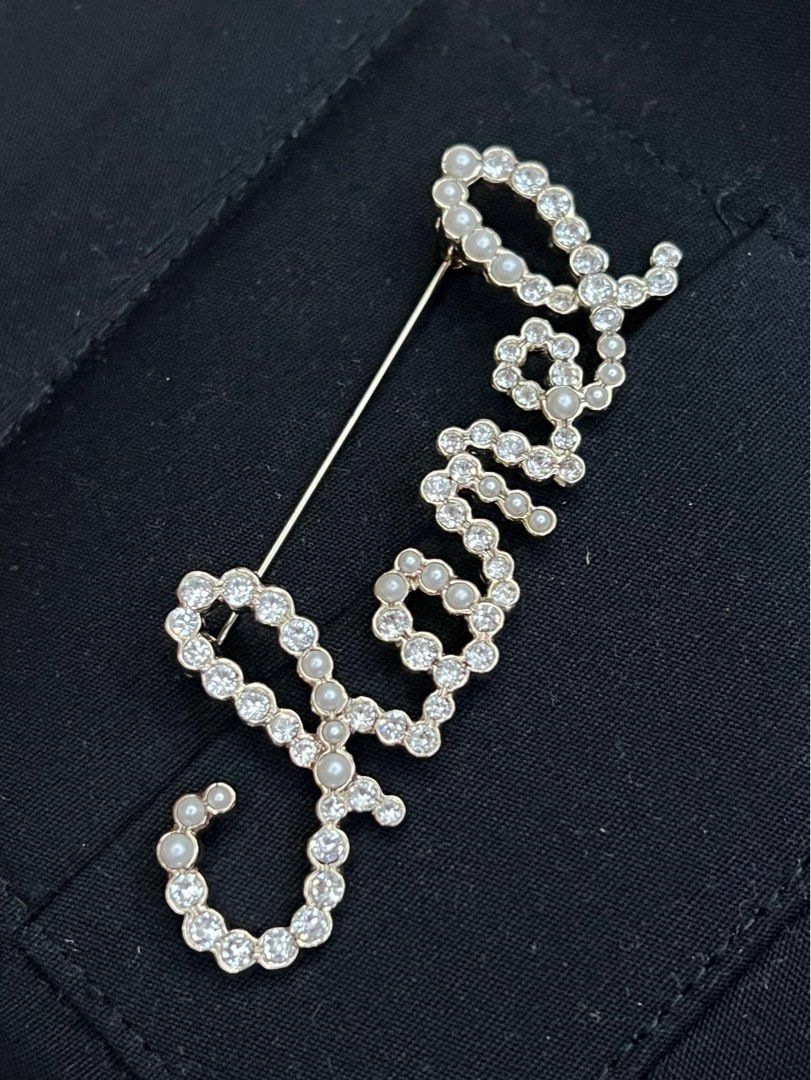 Chanel script brooch Luxury Accessories on Carousell