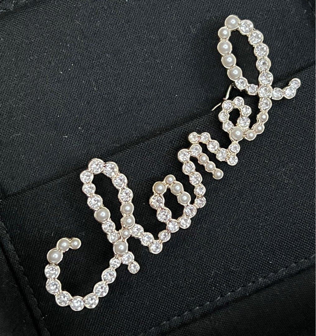 Chanel script hair pin