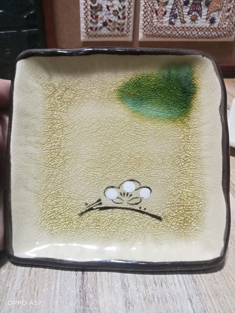 Japan Vintage Studio Ceramic Pottery Dish Flat Trinket (Category: Other Kitchenware & Tableware) located in Imelda. Submitted by japansurpluscollection (Listing ID 1313161592, Image 1). Description: Japan vintage collectible mura nalang compare sa orig price These perfect little dishes are great for pickled tsukemono, small sweets for tea ceremonies, pillar candles, soaps or even as coasters. 4.5" square x 0.75"h Microwave, dishwasher safe. Made 