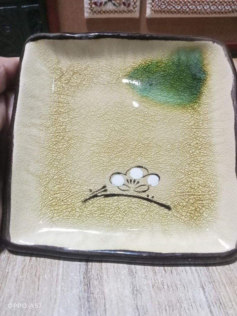 Japan Vintage Studio Ceramic Pottery Dish Flat Trinket (Category: Other Kitchenware & Tableware) located in Imelda. Submitted by japansurpluscollection (Listing ID 1313161592, Image 2). Description: Japan vintage collectible mura nalang compare sa orig price These perfect little dishes are great for pickled tsukemono, small sweets for tea ceremonies, pillar candles, soaps or even as coasters. 4.5" square x 0.75"h Microwave, dishwasher safe. Made 