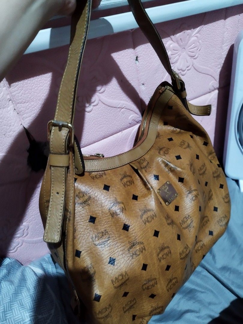 MCM Hobo Bag (Category: Luxury Bags & Wallets) located in Quezon City. Submitted by cloudymay (Listing ID 1313221731, Image 2). Description: 9/10 condition Korea Source Genuine Leather Slightly used. Minimal sign of use. Pretty in actual.
