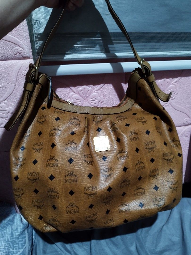 MCM Hobo Bag (Category: Luxury Bags & Wallets) located in Quezon City. Submitted by cloudymay (Listing ID 1313221731, Image 1). Description: 9/10 condition Korea Source Genuine Leather Slightly used. Minimal sign of use. Pretty in actual.
