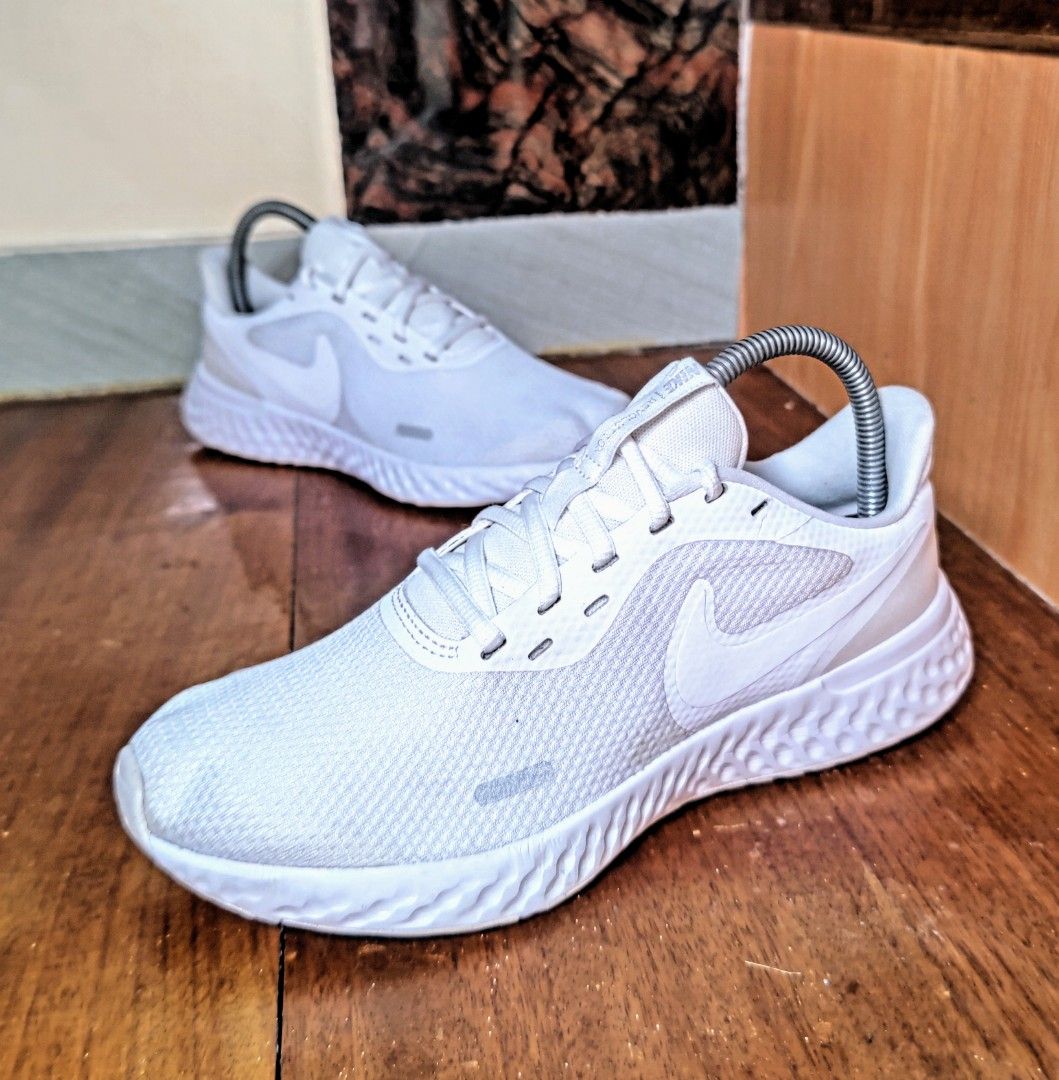 nike revolution triple white