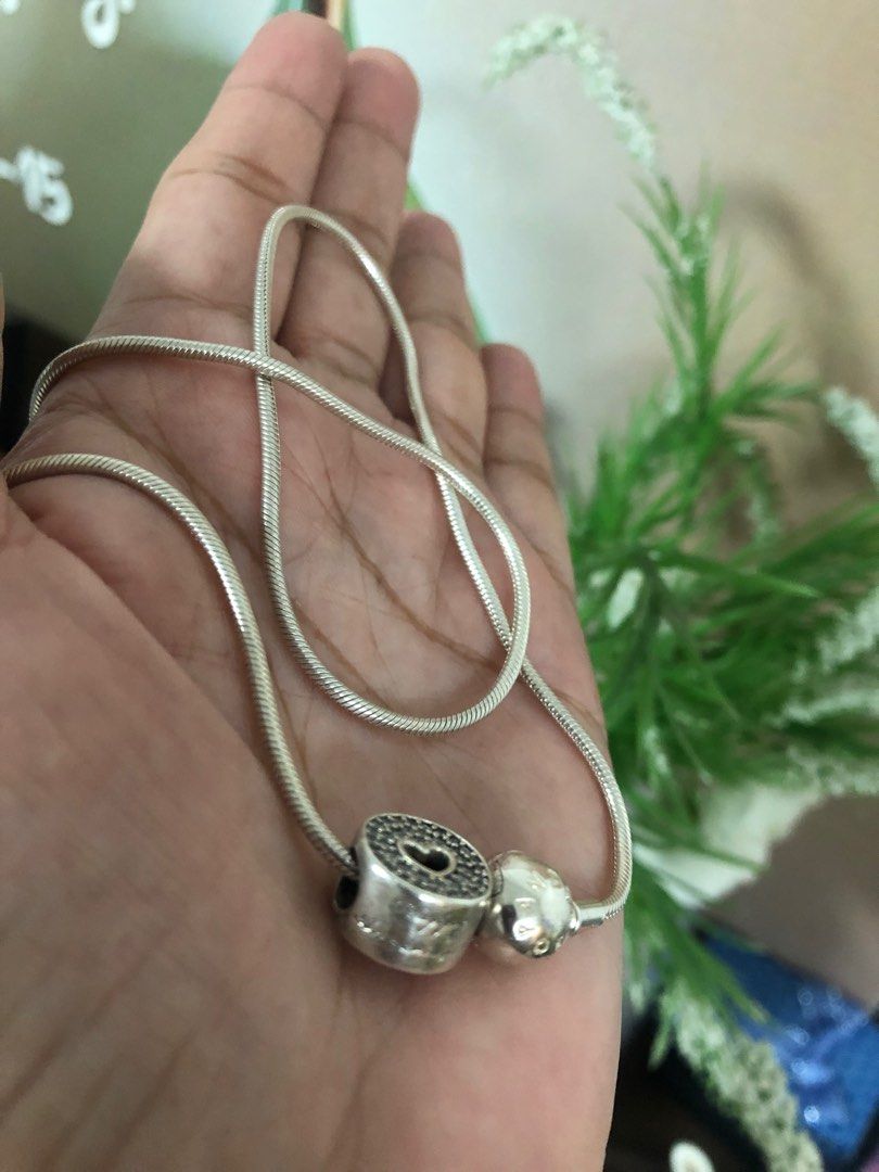 Pandora (Category: Luxury Accessories) located in Angeles City. Submitted by phynes (Listing ID 1313048003, Image 2). Description: Authentic pandora snake 19’7 haba in good condition no issue Charm anniversary - 1800 S925 Ale marking Mode payment Bank or GCash .